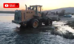 Batman Çayında mahsur kalanlar kepçeyle kurtarıldı