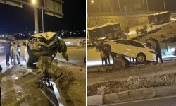 Batman'da ilginç kaza: Araç beton kaidede asılı kaldı
